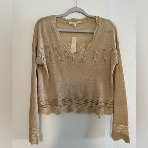 Never been worn tan knit long sleeve top from Francesca’s. Medium. New with tags